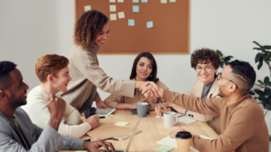 A group of people around a table.